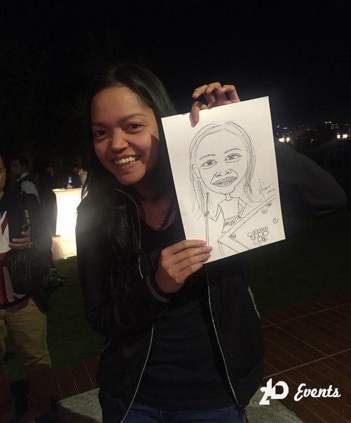 Female caricaturist in Dubai