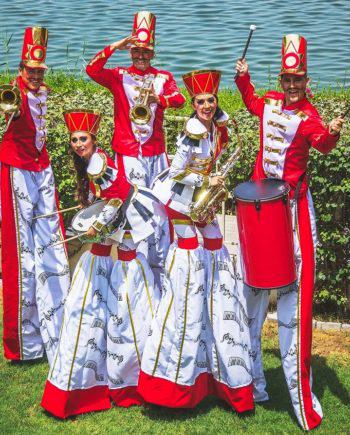 Marching band - stilt walkers parade in Dubai
