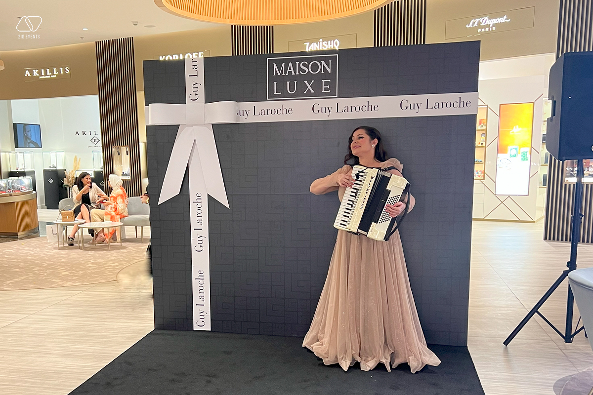FEMALE ACCORDION PLAYER FOR THE PROMOTIONAL EVENT 1 - FEMALE ACCORDION PLAYER FOR THE PROMOTIONAL EVENT