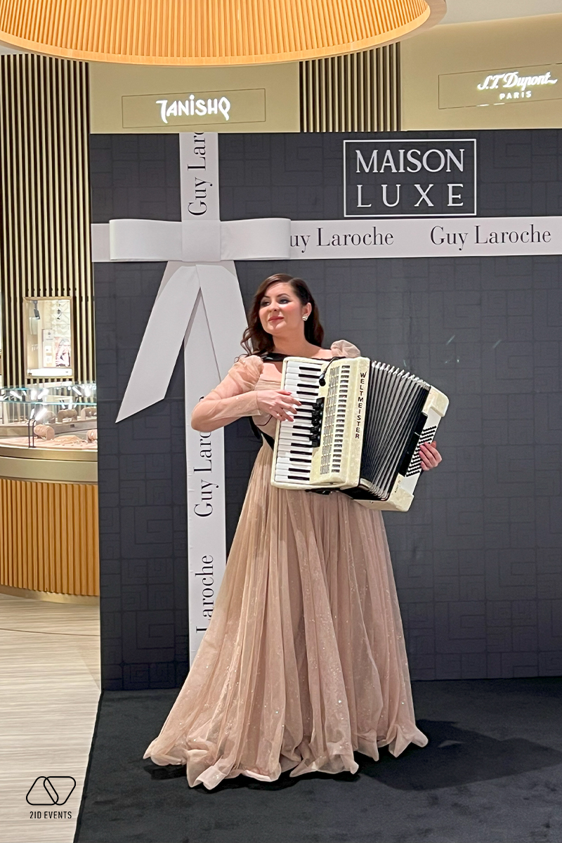 FEMALE ACCORDION PLAYER FOR THE PROMOTIONAL EVENT 2 - FEMALE ACCORDION PLAYER FOR THE PROMOTIONAL EVENT