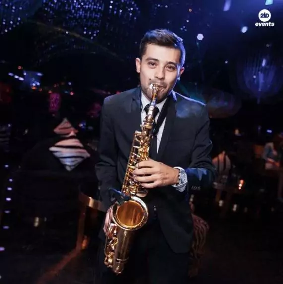 Male sax player in the UAE